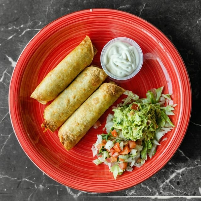Taquitos De Pollo.